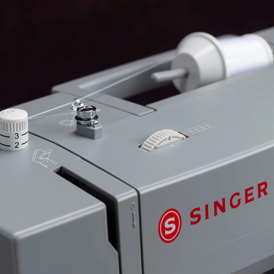 Singer HD6605C adjustable presser-foot pressure and upper threading controls