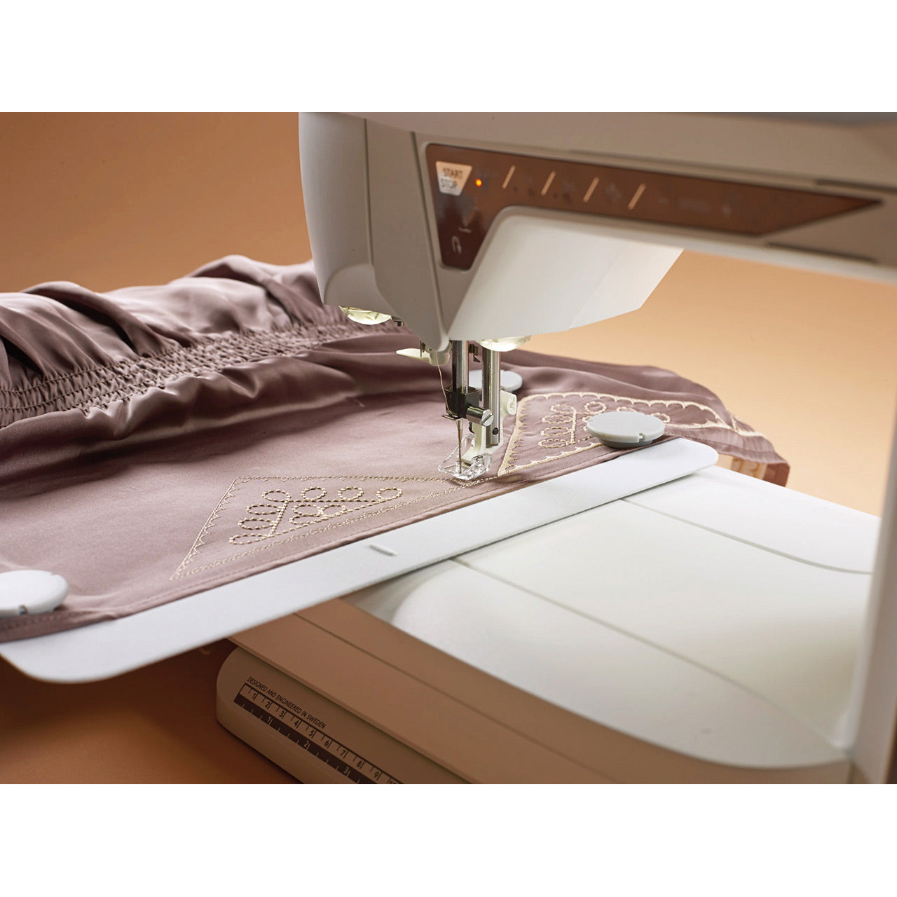 Husqvarna® Viking® DESIGNER TOPAZ™ 40 Sewing & Embroidery Machine