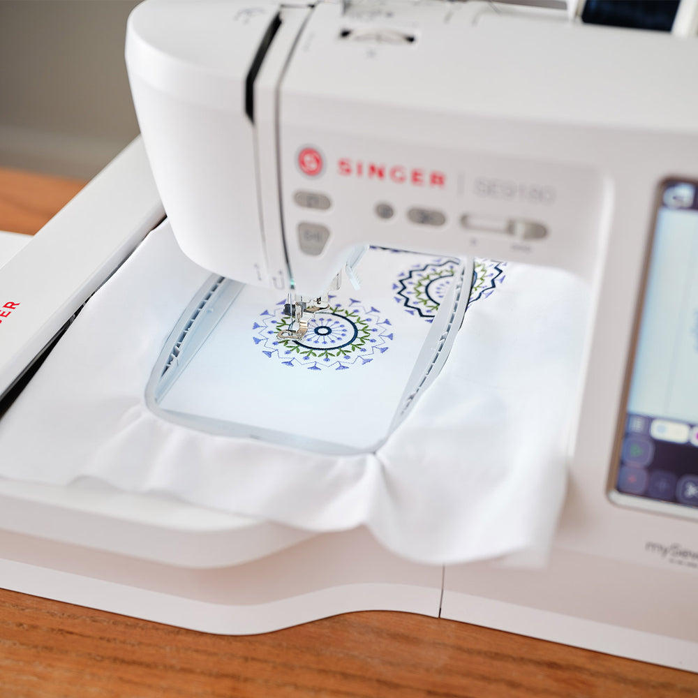 Singer SE9185 embroidering a decorative design inside the included hoop