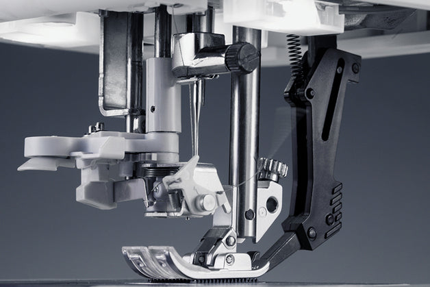 Automatisk nåletråder